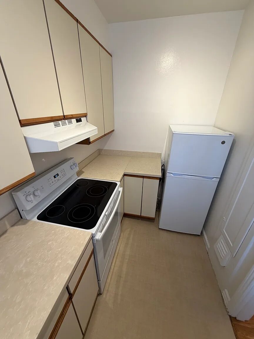 Kitchen counter run with range and refrigerator
